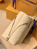 LOUIS VUITTON NEVERFULL MM 32 CREAM EMBOSSED COWHIDE LEATHER