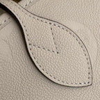 LOUIS VUITTON NEVERFULL MM 32 CREAM EMBOSSED COWHIDE LEATHER