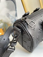 LOUIS VUITTON KEEPALL XS 21CM BLACK MONOGRAM SEAL