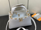 LOUIS VUITTON CAPUCINES MM 31 WHITE TAURILLON GOLD HARDWARE