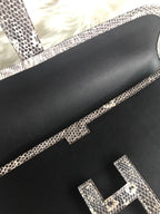 HERMES JIGE ELAN 29 CLUTCH IN BLACK CALFSKIN WITH WHITE LIZARD SKIN