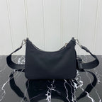 PRADA HOBO 22 BAG IN BLACK RE-NYLON WITH RED LOGO