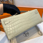 HERMES KELLY CUT 31 IN PEARL GRAY ALLIGATOR LEATHER WITH SILVER HARDWARE