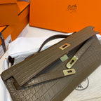 HERMES KELLY CUT 31 IN MOCHA BROWN ALLIGATOR LEATHER WITH GOLD HARDWARE