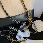 CHANEL GRABRIELLE SMALL 24 BACKPACK IN ALMOND BEIGE MIX BLACK CALFSKIN