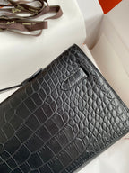 HERMES KELLY CUT 31 IN BLACK ALLIGATOR LEATHER WITH SILVER HARDWARE