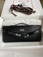 HERMES KELLY CUT 31 IN BLACK ALLIGATOR LEATHER WITH SILVER HARDWARE