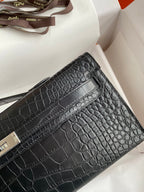 HERMES KELLY CUT 31 IN BLACK ALLIGATOR LEATHER WITH SILVER HARDWARE
