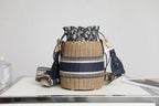 DIOR BUCKET BAG 19 IN BLACK OBLIQUE JACQUARD AND BEIGE WICKER