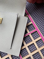 HERMES Kelly Pocket 13.5 White Epsom Ghw