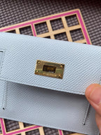 HERMES Kelly Pocket 13.5 Light Grey Epsom Ghw