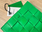 BOTTEGA VENETA SMALL CASSETTE 23 IN GREEN FRINGED CALFSKIN