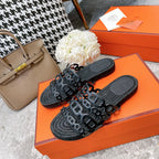 HERMES BLACK STRAW SOLE SLIPPERS BLACK LAMBSKIN
