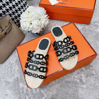 HERMES STRAW SOLE SLIPPERS BLACK LAMBSKIN