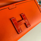 HERMES JIGE ELAN 29 CLUTCH IN BRIGHT ORANGE CALFSKIN WITH LIZARD SKIN