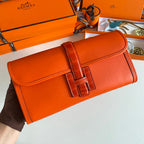 HERMES JIGE ELAN 29 CLUTCH IN BRIGHT ORANGE CALFSKIN WITH LIZARD SKIN