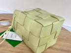 BOTTEGA VENETA SMALL CASSETTE BUCKET 18 IN PASTEL YELLOW CALFSKIN