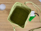 BOTTEGA VENETA SMALL CASSETTE BUCKET 18 IN PASTEL YELLOW CALFSKIN