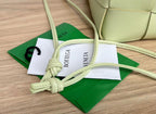 BOTTEGA VENETA SMALL CASSETTE BUCKET 18 IN PASTEL YELLOW CALFSKIN