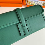 HERMES JIGE ELAN 29 CLUTCH IN FOREST GREEN CALFSKIN