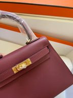 HERMES KELLY MINI 20 BAG IN GARNET RED CALFSKIN WITH GOLD HARDWARE
