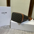 CELINE BUCKET 30 IN BLACK TRIOMPHE CANVAS AND RED BROWN CALFSKIN TRIM