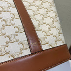 CELINE BUCKET 30 IN WHITE TRIOMPHE CANVAS AND RED BROWN CALFSKIN TRIM