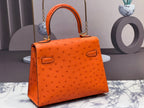 HERMES KELLY BAG 20 IN FIRE ORANGE OSTRICH LEATHER WITH GOLD HARDWARE