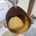 CELINE BUCKET 33 IN WHITE TRIOMPHE CANVAS AND BRONZE BROWN CALFSKIN TRIM