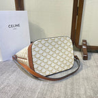 CELINE BUCKET 33 IN WHITE TRIOMPHE CANVAS AND BRONZE BROWN CALFSKIN TRIM