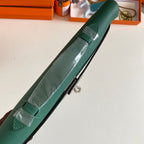 HERMES KELLY CUT 31 IN GREEN FOREST CALFSKIN WITH SILVER HARDWARE