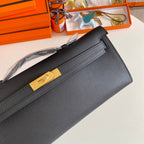 HERMES KELLY CUT 31 IN BLACK CALFSKIN WITH GOLD HARDWARE