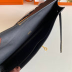 HERMES KELLY CUT 31 IN BLACK CALFSKIN WITH GOLD HARDWARE