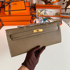 HERMES KELLY CUT 31 IN MOCHA BROWN CALFSKIN WITH GOLD HARDWARE