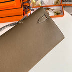 HERMES KELLY CUT 31 IN MOCHA BROWN CALFSKIN WITH GOLD HARDWARE