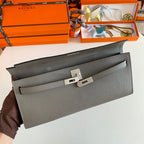 HERMES KELLY CUT 31 IN WOOD BROWN CALFSKIN WITH SILVER HARDWARE