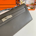 HERMES KELLY CUT 31 IN WOOD BROWN CALFSKIN WITH SILVER HARDWARE