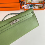 HERMES KELLY CUT 31 IN APPLE GREEN CALFSKIN WITH SILVER HARDWARE