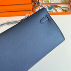 HERMES KELLY CUT 31 IN CLASSIC BLUE CALFSKIN WITH GOLD HARDWARE