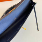 HERMES KELLY CUT 31 IN CLASSIC BLUE CALFSKIN WITH GOLD HARDWARE