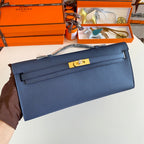 HERMES KELLY CUT 31 IN CLASSIC BLUE CALFSKIN WITH GOLD HARDWARE
