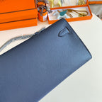 HERMES KELLY CUT 31 IN CLASSIC BLUE CALFSKIN WITH SILVER HARDWARE