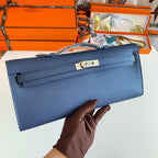 HERMES KELLY CUT 31 IN CLASSIC BLUE CALFSKIN WITH SILVER HARDWARE