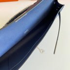 HERMES KELLY CUT 31 IN CLASSIC BLUE CALFSKIN WITH SILVER HARDWARE