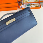 HERMES KELLY CUT 31 IN CLASSIC BLUE CALFSKIN WITH SILVER HARDWARE