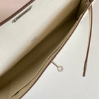 HERMES KELLY CUT 31 IN BEIGE CREAM CALFSKIN WITH SILVER HARDWARE