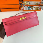 HERMES KELLY CUT 31 IN WATERMELON PINK CALFSKIN WITH GOLD HARDWARE
