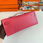 HERMES KELLY CUT 31 IN WATERMELON PINK CALFSKIN WITH GOLD HARDWARE