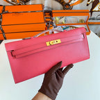 HERMES KELLY CUT 31 IN WATERMELON PINK CALFSKIN WITH GOLD HARDWARE