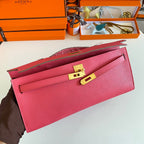 HERMES KELLY CUT 31 IN WATERMELON PINK CALFSKIN WITH GOLD HARDWARE